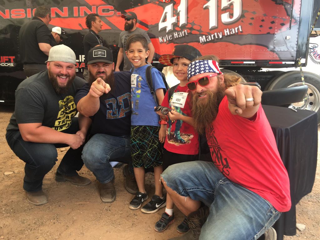 Heavy D and Diesel Dave posing with some youngsters