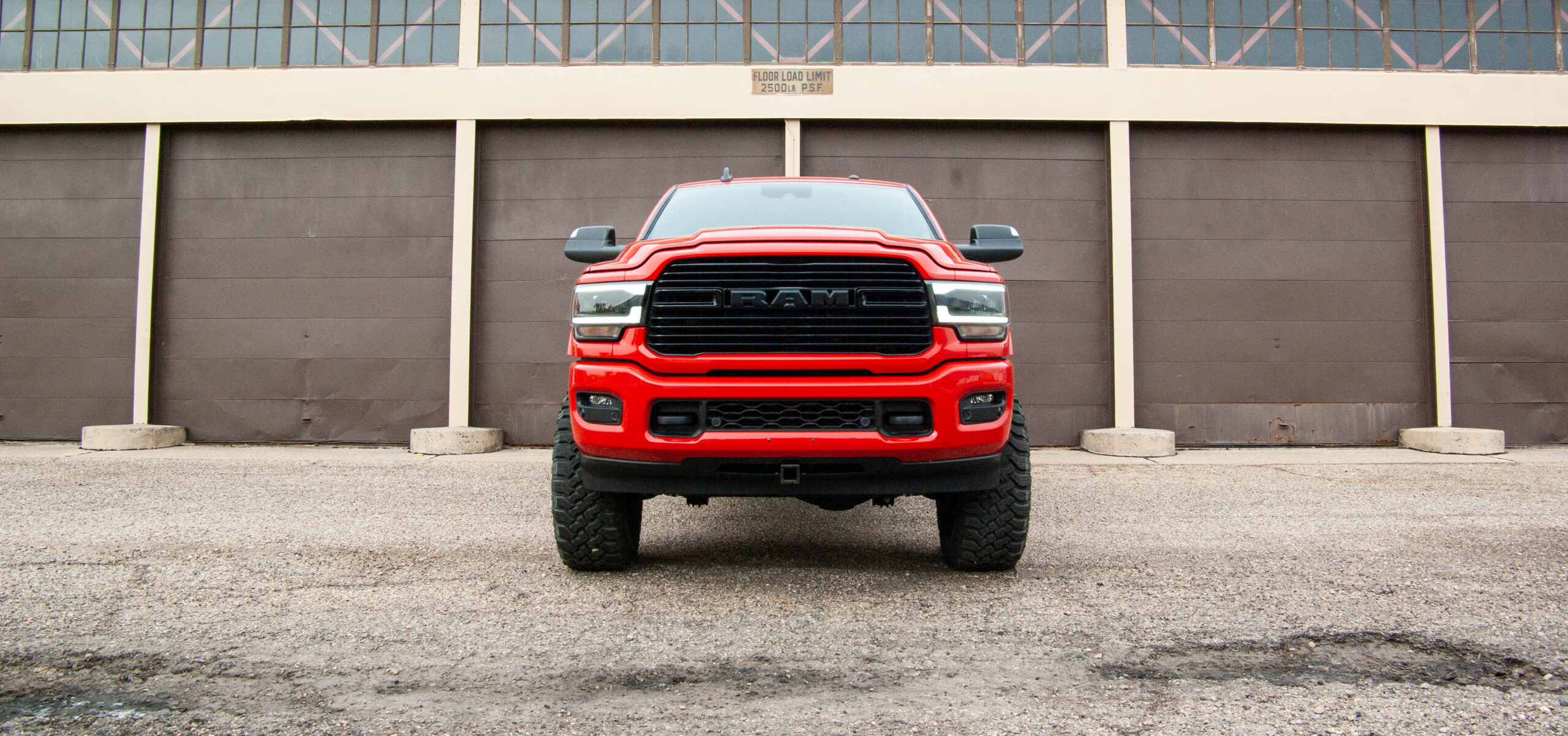 Front three-quarter view of a lifted Ram 3500 Mega Cab
