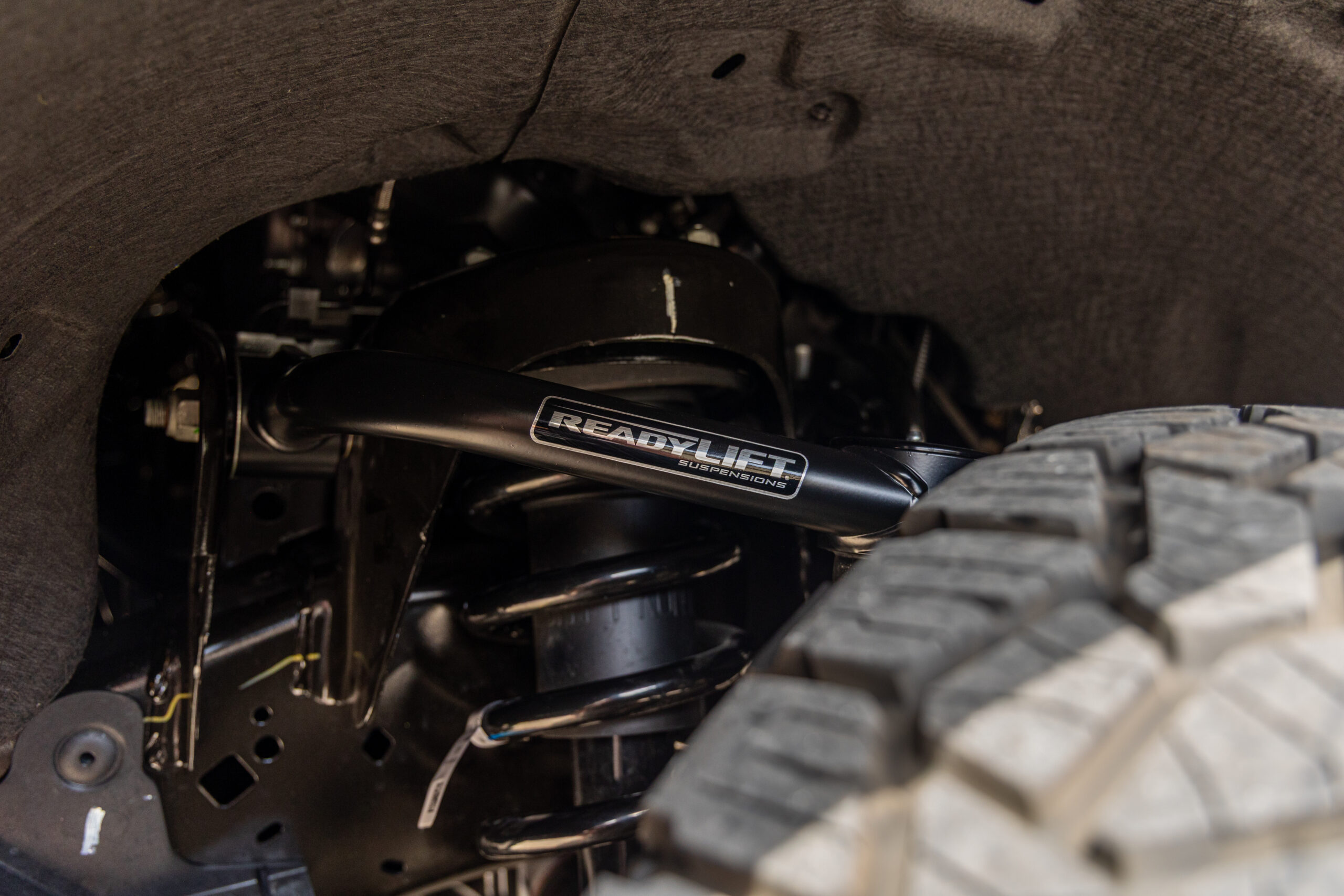 ReadyLIFT upper control arm installed on a Ford Expedition